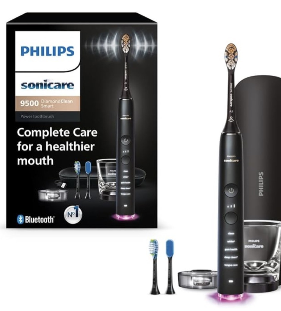 Philips Sonicare DiamondClean 9500 electric toothbrush in Black with three brush heads, charging case, and charging glass